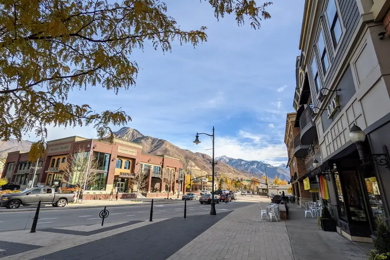 A street in Holladay, Utah with the Wasatch Range behind it